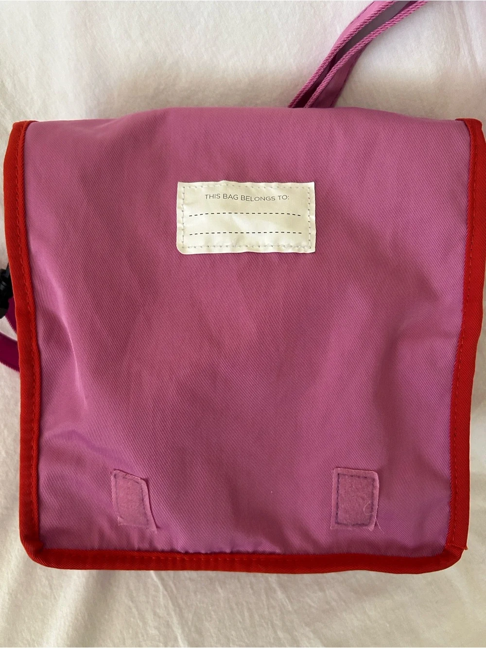 OMIE Pink Crossbody Bag with Red Trim